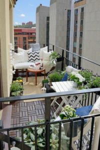 modern-terrace-design-pictures-balcony-furniture-sofa-pillows-rattan-carpet